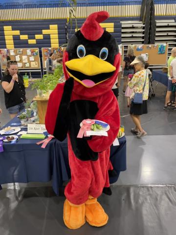 The Abingdon Cardinal at the Arlington County Fair with prize-winning plants from Abingdon's garden
