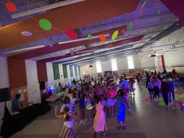 Students celebrating at a Glow Party